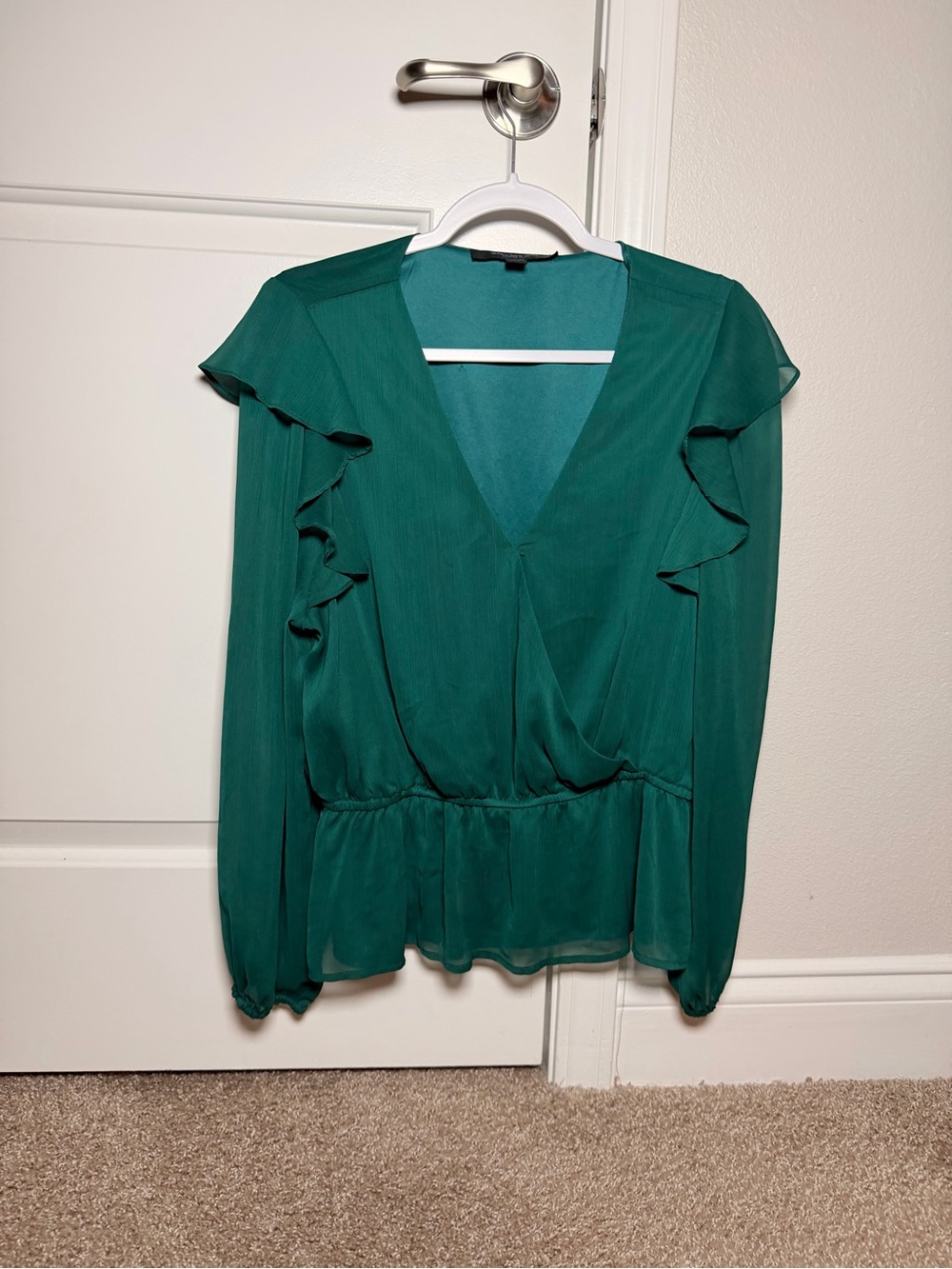 V-Neck Ruffle Peplum Blouse in Emerald Green
